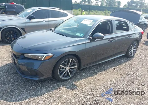 2023 Honda Civic Touring z USA, uszkodzony, nr VIN 2HGFE1F97PH323864